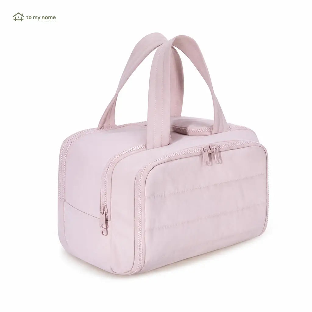 Puffy 4-in-1 travel toiletry bag with waterproof compartments and handles for cosmetics, toiletries, and suitcase organization on weekend getaways and longer trips Tomyhome Global
