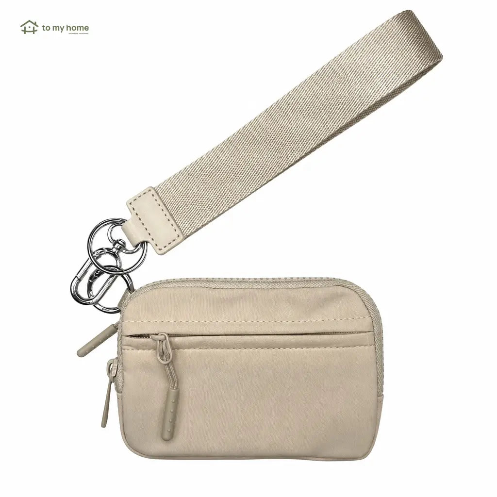 Lightweight scratchproof wristlet wallet with RFID protection, water-repellent nylon, and compact organization for cards, ID, and essentials on busy everyday outings Tomyhome Global