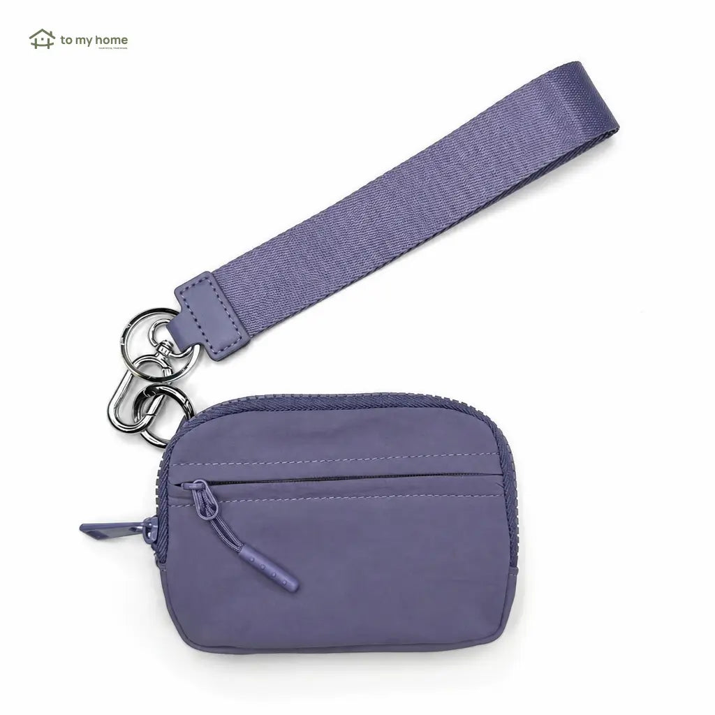 Lightweight scratchproof wristlet wallet with RFID protection, water-repellent nylon, and compact organization for cards, ID, and essentials on busy everyday outings Tomyhome Global